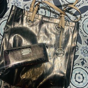 MK metallic large purse and wallet.